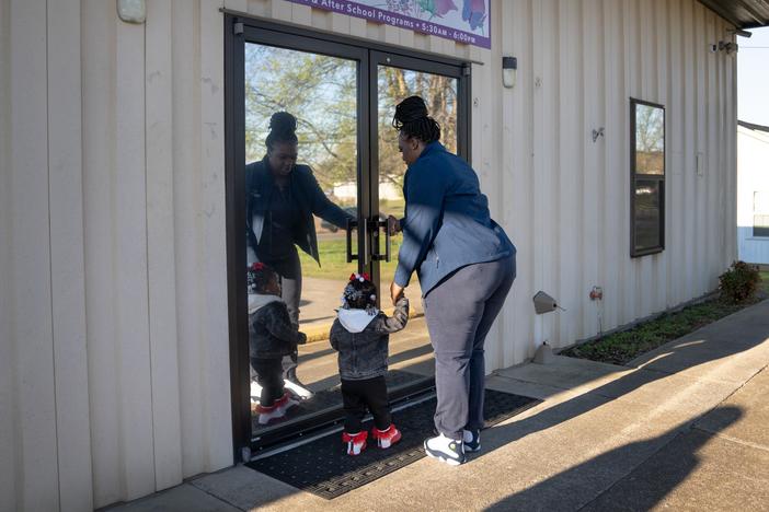 On her way to work at the Mazda Toyota Manufacturing plant in northern Alabama, D'Koya Mathis takes her 2-year-old daughter Zharia to Ms. Pat's Child Care & Development Center.