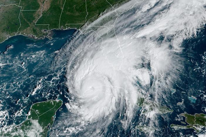 Hurricane Ian passes over western Cuba in 2022, as captured by a U.S. weather satellite. Climate change is causing more extreme weather, and creates new challenges for weather forecasters.