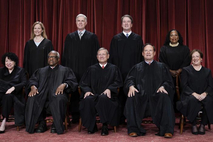 Members of the Supreme Court sit for a new group portrait following the addition of Associate Justice Ketanji Brown Jackson, at the Supreme Court building in Washington, D.C., on Oct. 7, 2022.