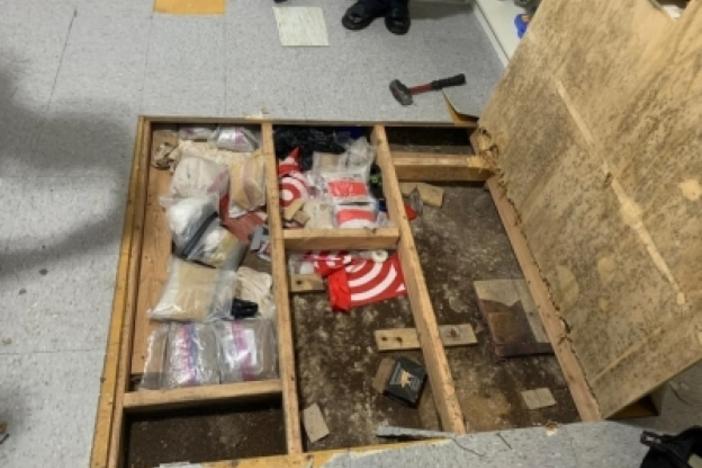 Four children under the age of 3 were poisoned — one fatally — by opioids at a day care in the Bronx, N.Y. Here, a "trap," a hidden compartment holding drugs under the day care's floor, is seen in an image from a Drug Enforcement Administration affidavit. Official say a search turned up fentanyl and drug-processing equipment at the day care.