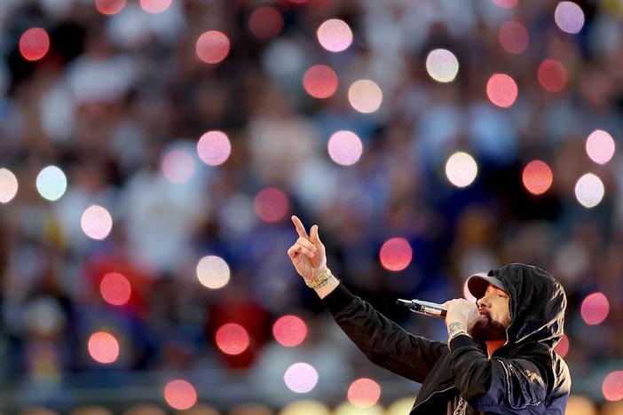 Eminem, performing here during the Super Bowl LVI Halftime Show at SoFi Stadium in 2022, returns to the top 10 of the <em>Billboard</em> Hot 100 chart this week with "Houdini."
