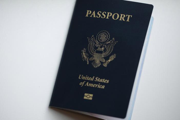 The cover of a U.S. Passport is displayed in Tigard, Ore., Dec. 11, 2021.