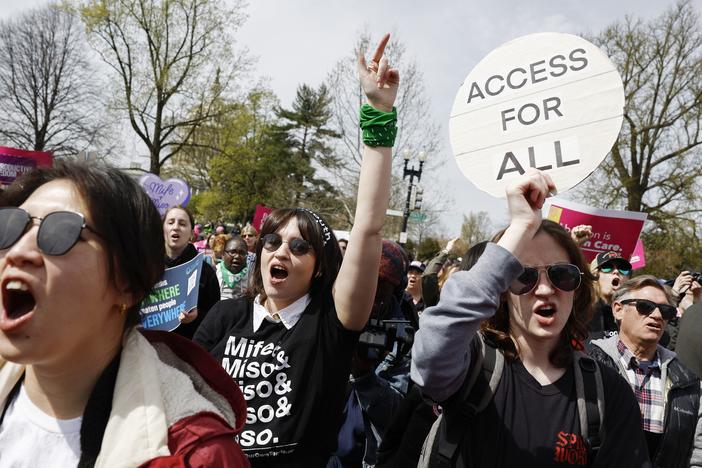 Demonstrators hold an abortion-rights rally outside the Supreme Court on March 26 as the justices of the court heard oral arguments in<em> Food and Drug Administration v. Alliance for Hippocratic Medicine</em>.