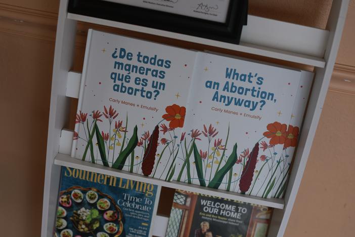 Books sit on a shelf at a clinic that provides abortion care on April 30, in Jacksonville, Fla. A six-week abortion ban that Florida Gov. Ron DeSantis signed went into effect on May 1.