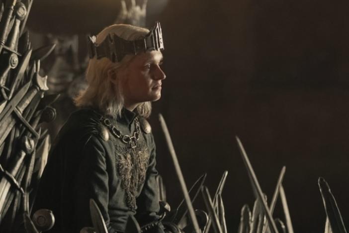 Aegon II (Tom Glynn-Carney) on the famously pointy and rusty Iron Throne.