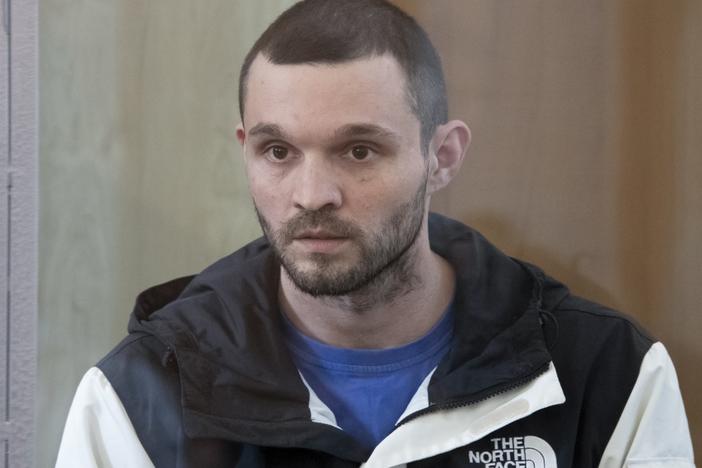 U.S. Army Staff Sgt. Gordon Black sits in a glass cage in courtroom in Vladivostok, Russia, on Wednesday.