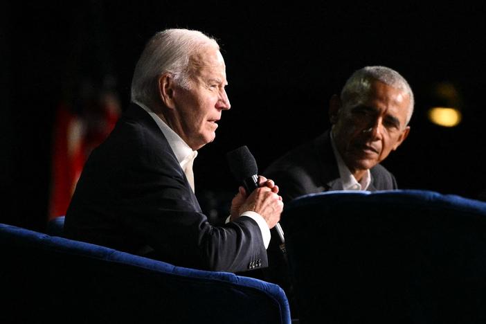 President Biden speaks next to former President Barack Obama onstage during a campaign fundraiser in Los Angeles on June 15,