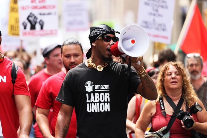 Amazon Labor Union President Chris Smalls leads a pro-union march in New York City in 2022. Workers at an Amazon warehouse on Staten Island voted to unionize that year, but they've since struggled to negotiate a contract with the company. 