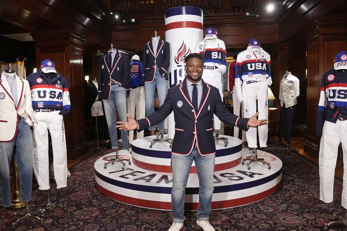 Olympic athlete in fencing, Daryl Homer, models the Team USA Paris Olympics opening ceremony uniform at Ralph Lauren headquarters on Monday in New York.