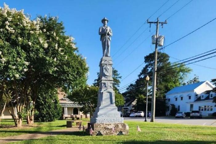A Confederate statue in front of the courthouse in Columbia, N.C., with a plaque on the bottom that reads: “IN APPRECIATION OF OUR FAITHFUL SLAVES.”
