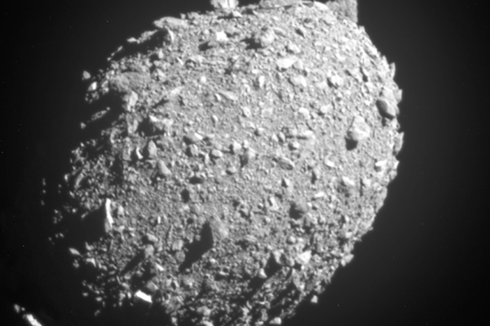 Asteroid moonlet Dimorphos as seen by NASA's DART spacecraft 11 seconds before the impact that shifted its path through space, in the first test of asteroid deflection.