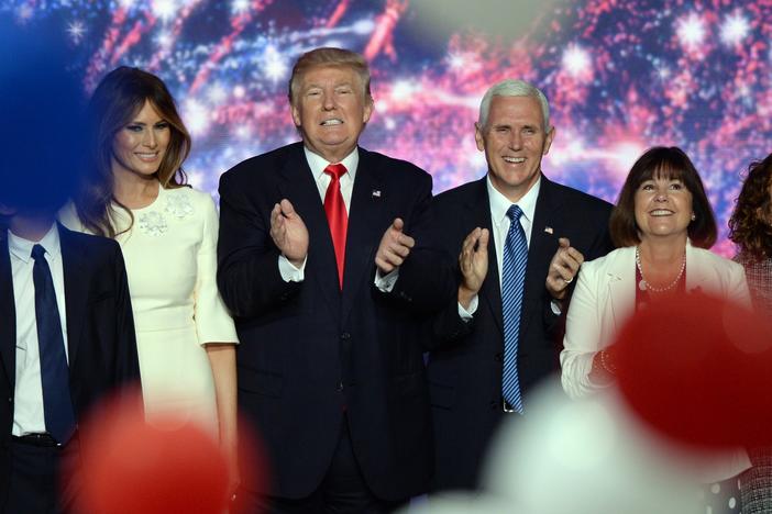 In 2016, Republican presidential nominee Donald Trump, left, and his running mate Indiana Gov. Mike Pence celebrate after accepting the nomination for president at the Republican National Convention in Cleveland.