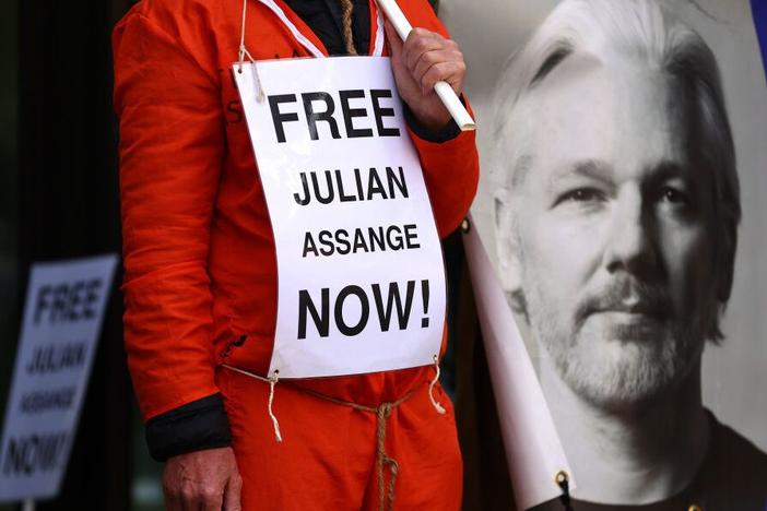A supporter of Julian Assange protests in front of Westminster Magistrates Court in London, while calling for his release from Belmarsh Prison, on April 14.