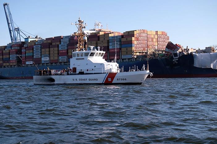 The U.S. Coast Guard Cutter Sailfish prepares to escort the MV Dali during its transit from the Port of Baltimore to the Port of Virginia in Norfolk on Monday, June 24, 2024.