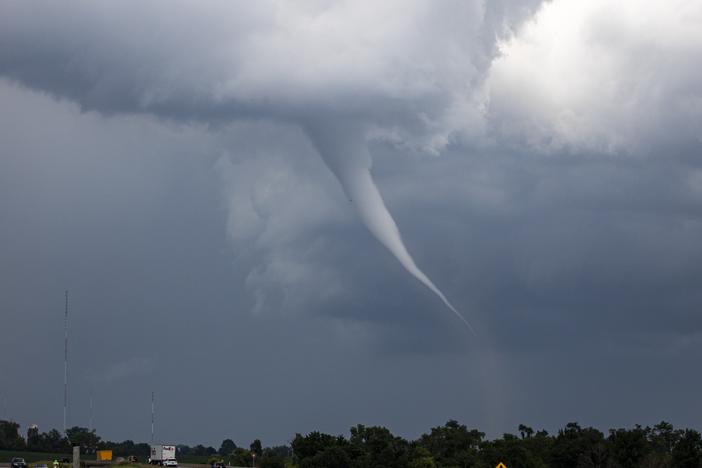 A tornado is seen near Cedar Rapids, Iowa, on Tuesday. More severe weather was forecast to move into the region, potentially bringing large hail, damaging winds and tornadoes in parts of western Iowa and eastern Nebraska, according to the National Weather Service.