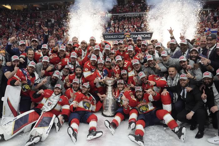 The Florida Panthers team poses with the Stanley Cup trophy after defeating the Edmonton Oilers in Game 7 of the NHL hockey Stanley Cup Final, on Monday in Sunrise, Fla. The Panthers defeated the Oilers 2-1. 