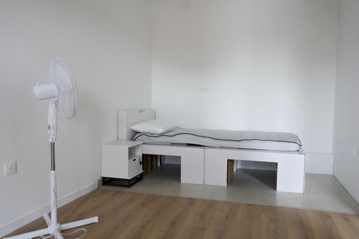 A bedroom of the Olympic Village in Saint-Denis, north of Paris, photographed in February. The buildings will be cooled with a system of water pipes beneath the floor, rather than air conditioning. 