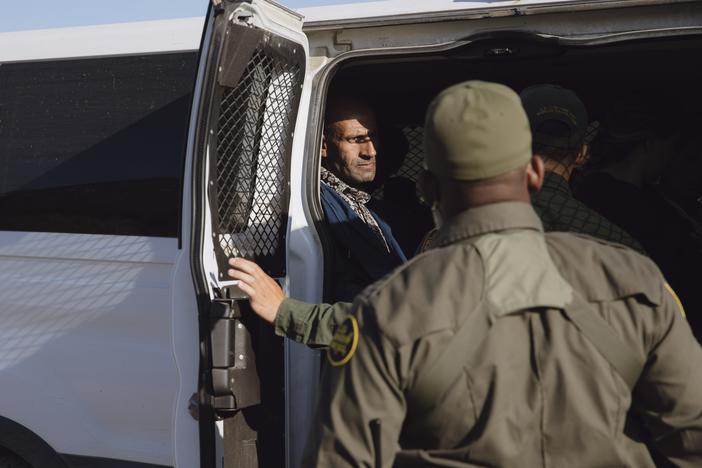 Border patrol agents pick up migrants waiting to be processed in Dulzara, California on June 25, 2024.