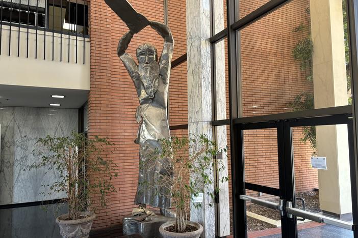 A statue of Moses smashing the tablets of the 10 Commandments is on display in the atrium of Hebrew Union College in Los Angeles. The 17-foot-tall sculpture is on loan from the Skirball Cultural Center. 