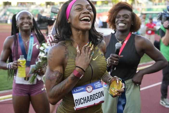 Sha'Carri Richardson celebrates her win in the women's 100-meter finals during the U.S. Track and Field Olympic Team Trials on Saturday in Eugene, Ore.