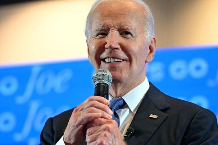 President Biden, seen here at a watch party in Atlanta, Ga. on June 27, told campaign staffers on Wednesday that he is staying in the presidential race.