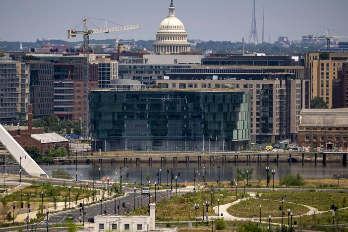 The newly built DC Water Headquarters across the Anacostia River and the Dome of the U.S. Capitol Building are visible from the Department of Homeland Security's St. Elizabeths Campus in Washington, June 15, 2023.