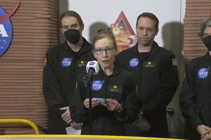 In this image made from video provided by NASA, CHAPEA commander Kelly Haston speaks in front of other crew members at Johnson Space Center in Houston, Texas, on Saturday.