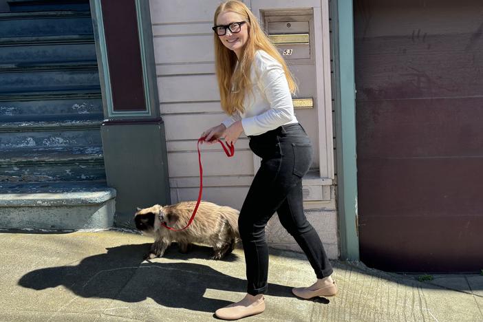 Jennifer Privett takes her Himalayan cat Jean Claude out for a stroll in San Francisco on June 28.
