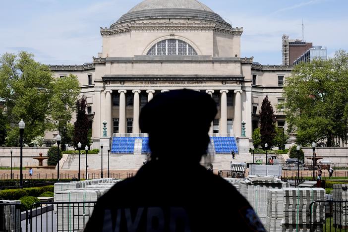 A New York City police officer looks over the center of Columbia University ahead of a large graduation ceremony in May, following weeks of pro-Palestinian protests.