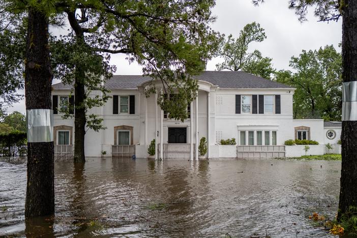 A home is surrounded by floodwater in Texas. Beryl hit the state as a Category-1 hurricane. The remnants of the storm are expected to move far from the ocean toward the Midwest, where they also pose risks of dangerous flooding.
