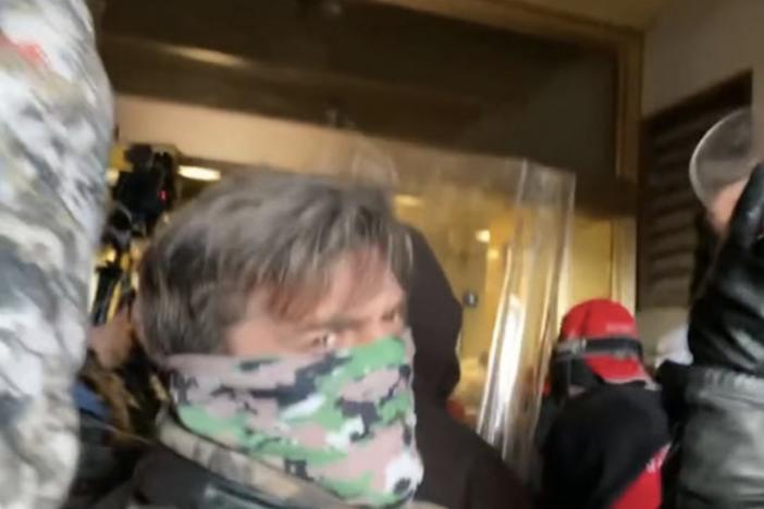Jay Johnston has pleaded guilty to a felony charge related to the Jan. 6, 2021, attack on the U.S. Capitol. He's seen here in an image from an FBI affidavit.