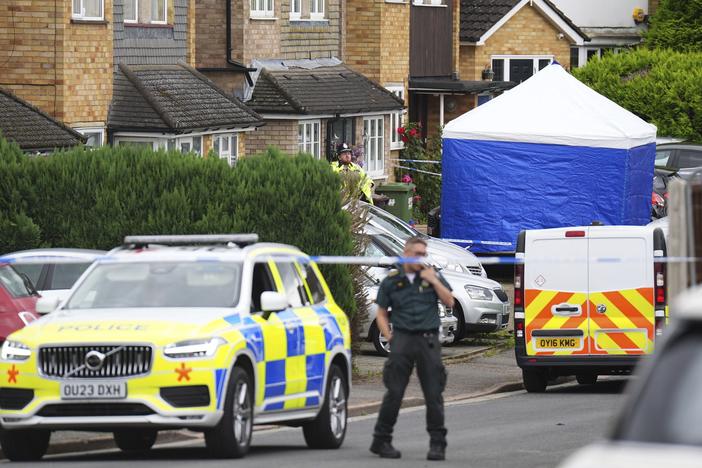 Police and emergency services at the scene in Ashlyn Close, Bushey, north of London, on Wednesday.