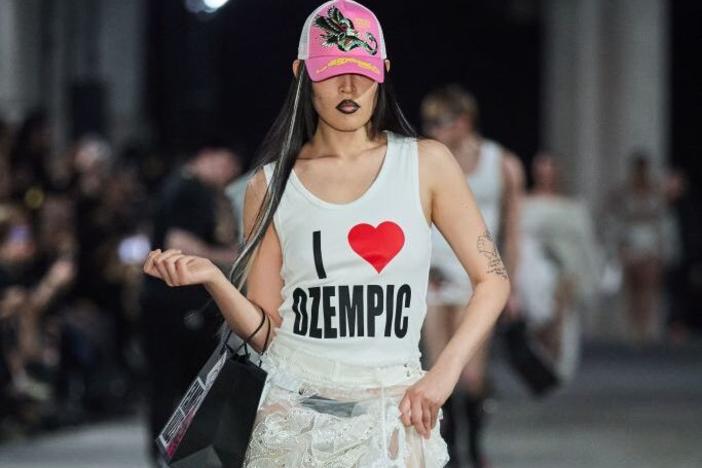 A T-shirt from fashion brand Namilia shown during Berlin Fashion on July 3, 2024 sparked an outcry on the brand's Instagram, with readers noting that Ozempic is in short supply for people with a medical need for it.