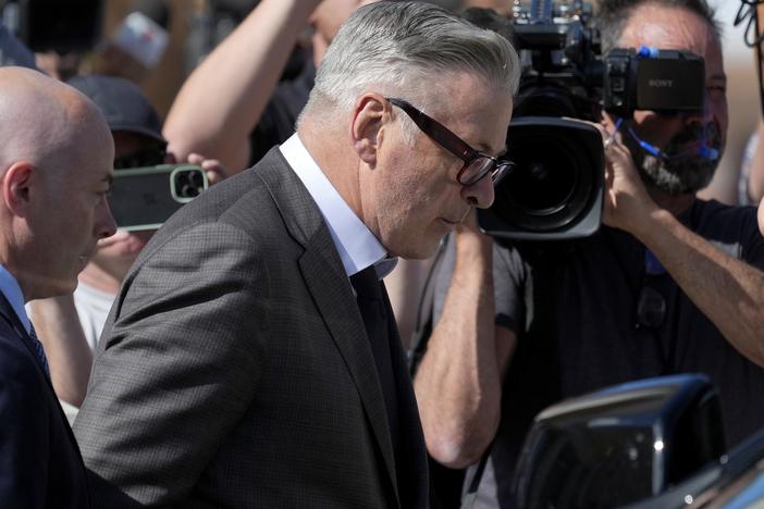 Actor Alec Baldwin leaves court after jury selection on Tuesday. Baldwin's wife, Hilaria, and his brother, actor Stephen Baldwin, were with him in the courtroom. 