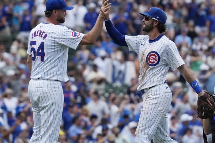 Chicago Cubs relief pitcher Colten Brewer, left, celebrates with Dansby Swanson after the Cubs defeated the San Francisco Giants 6-5 in a baseball game in Chicago, Wednesday, June 19, 2024. 