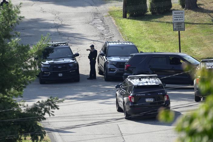 Law enforcement block a street in Bethel Park, Pa., that they say was a residence of Thomas Matthew Crooks, the suspected shooter of former President Donald Trump, on Sunday. 