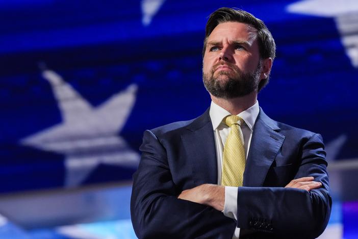 J.D. Vance, former President Donald Trump's vice presidential running mate, stands at a podium during a walkthrough for the 2024 Republican National Convention at the Fiserv Forum in Milkwaukee this week.