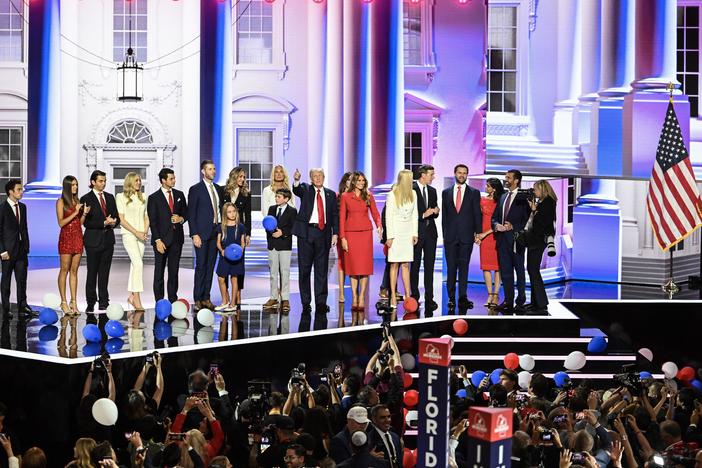 Former US President and 2024 Republican presidential candidate Donald Trump stands alonside former US First Lady Melania Trump and family after he accepted his party's nomination on the last day of the 2024 Republican National Convention at the Fiserv Forum in Milwaukee, Wisconsin, on July 18, 2024. 