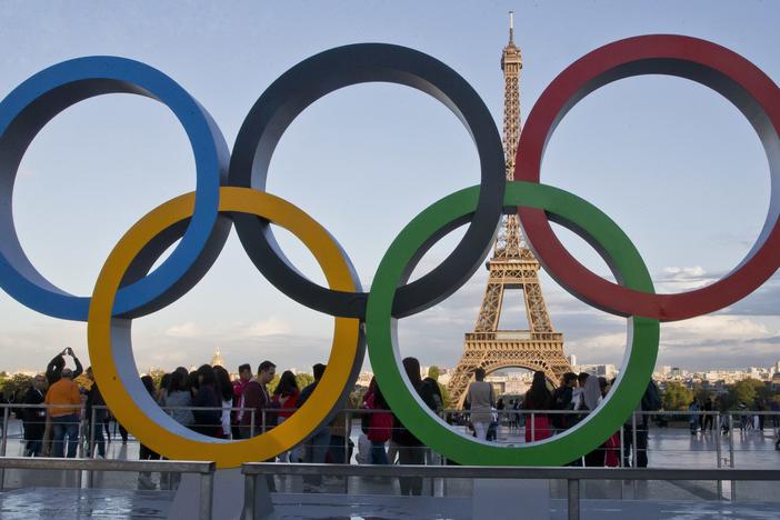The Olympic rings are seen at Trocadero Plaza, the site of the opening ceremony's finale celebrations, overlooking the Eiffel Tower in Paris.