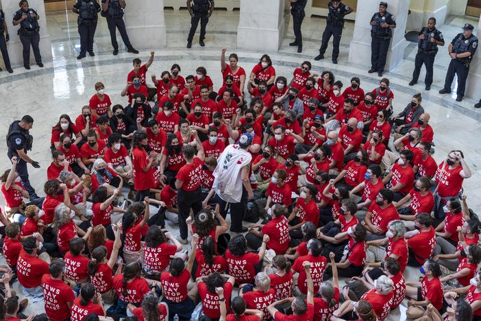Demonstrators protest against the military policies of Israel on Tuesday in the Cannon House Office Building at the Capitol in Washington, D.C.