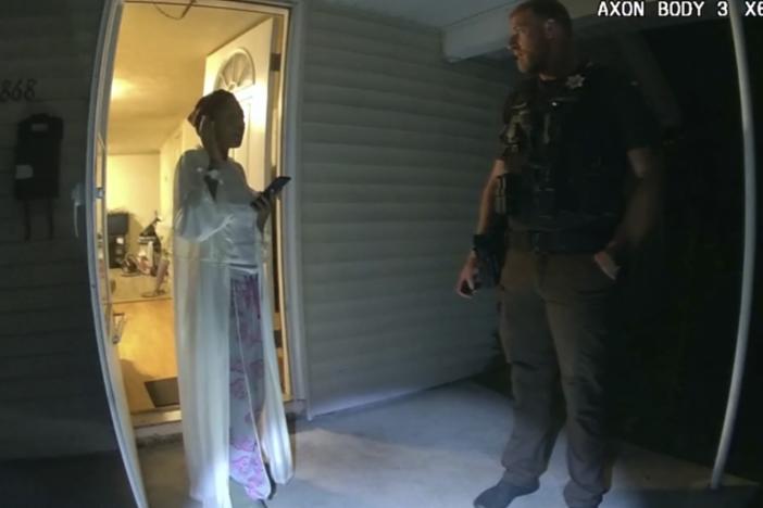 In this image taken from body camera video released by Illinois State Police, Sonya Massey, left, talks with former Sangamon County Sheriff’s Deputy Sean Grayson outside her home in Springfield, Ill., July 6, 2024.