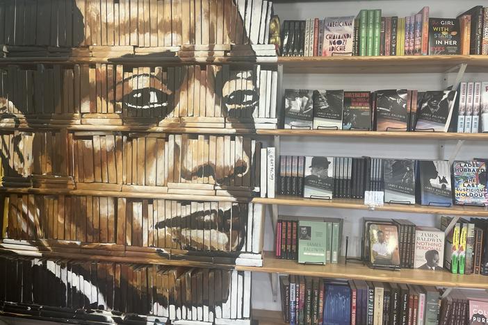  James Baldwin's face is painted on a decorative bookcase inside the Baldwin & Co. bookstore in New Orleans.