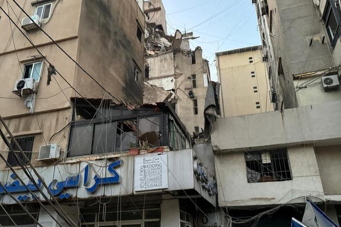 A view of buildings shows damage after what security sources said was a strike on Beirut's southern suburbs, on Tuesday.