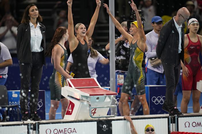 Swimmers from Australia celebrate after winning the women's 4x100-meter freestyle relay final at the 2024 Summer Olympics last Saturday in Nanterre, France. (AP Photo/Petr David Josek)