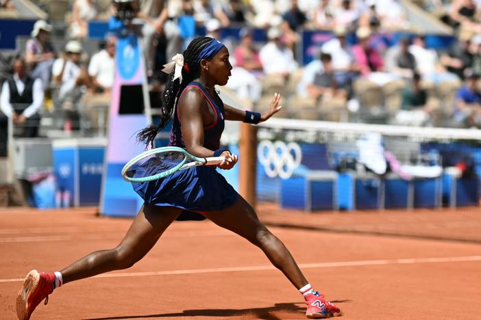 Coco Gauff hits a return shot to Croatia's Donna Vekic during their third-round tennis match on Court Philippe-Chatrier at the Roland-Garros Stadium during the Paris 2024 Olympic Games. 