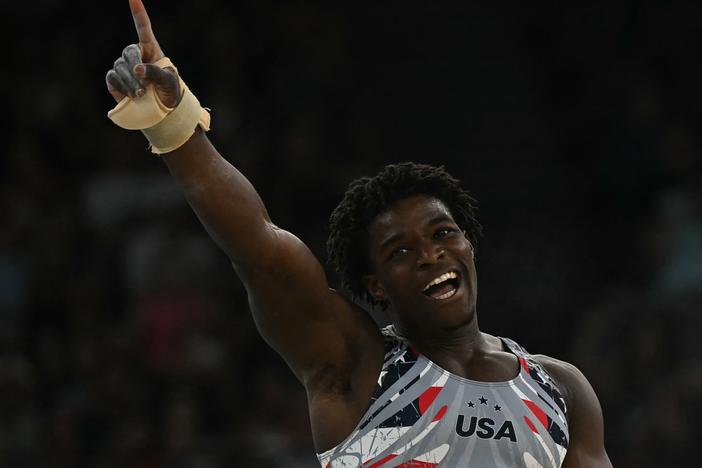 Frederick Richard reacts during the gymnastics men's team final Monday during the Paris 2024 Olympic Games at Bercy Arena. Frederick's enthusiasm, zeal and huge social media presence are fueling excitement in Paris and beyond. 