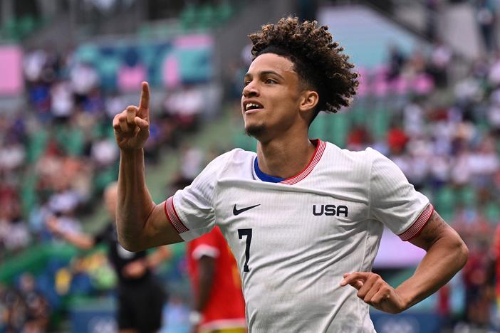 USA's Kevin Paredes celebrates scoring his team's second goal during a group match at the Paris Olympics between the United States and Guinea on Tuesday in Saint-Etienne, France. The U.S. defeated Guinea 3-0 to advance to the quarterfinals.