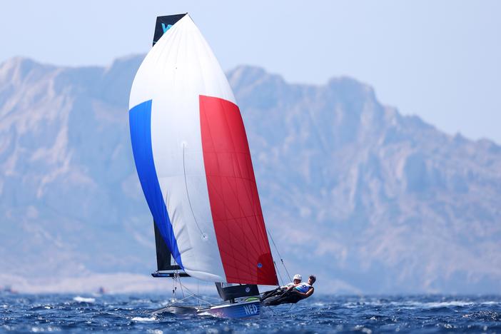 Odile van Aanholt and Annette Duetz of Team Netherlands sailed to gold in the women's skiff 49erFX class medal race on Friday, in a dramatic race that included a small detour.