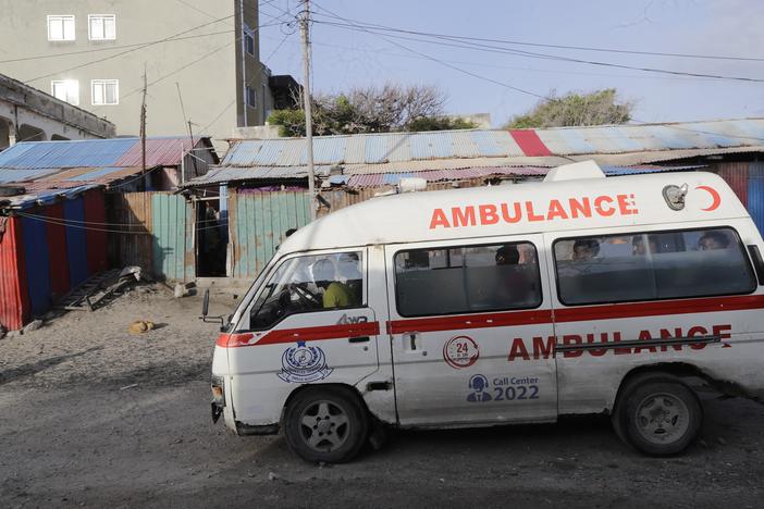 An ambulance is seen on the beach following an attack in Mogadishu, Somalia, on Saturday.