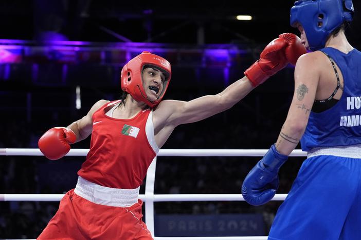 Algeria's Imane Khelif (left) hits Hungary's Anna Hamori in their women's 66kg quarterfinal boxing match at the 2024 Summer Olympics on Saturday in Paris.